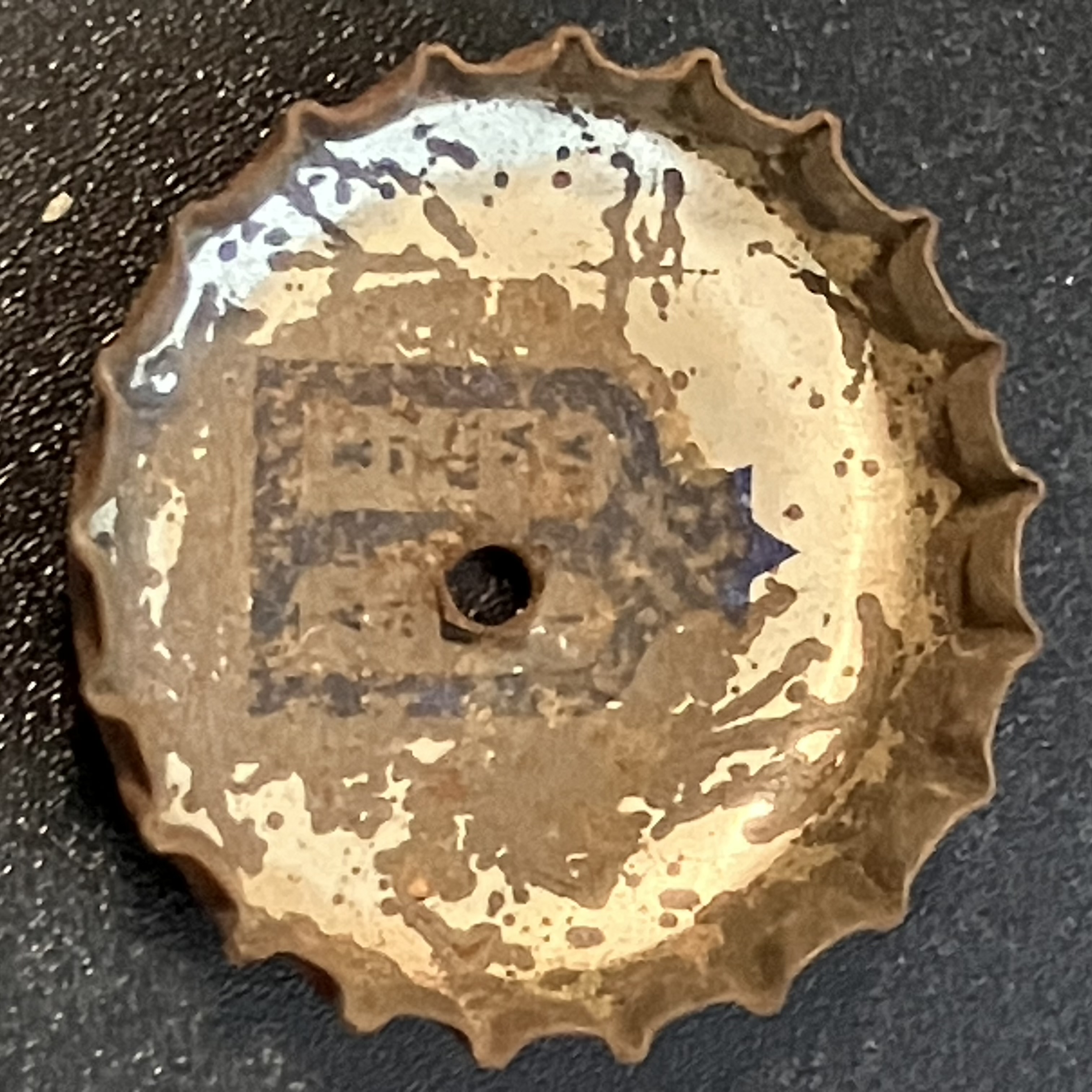 crown-cap liner of unadvertised variant