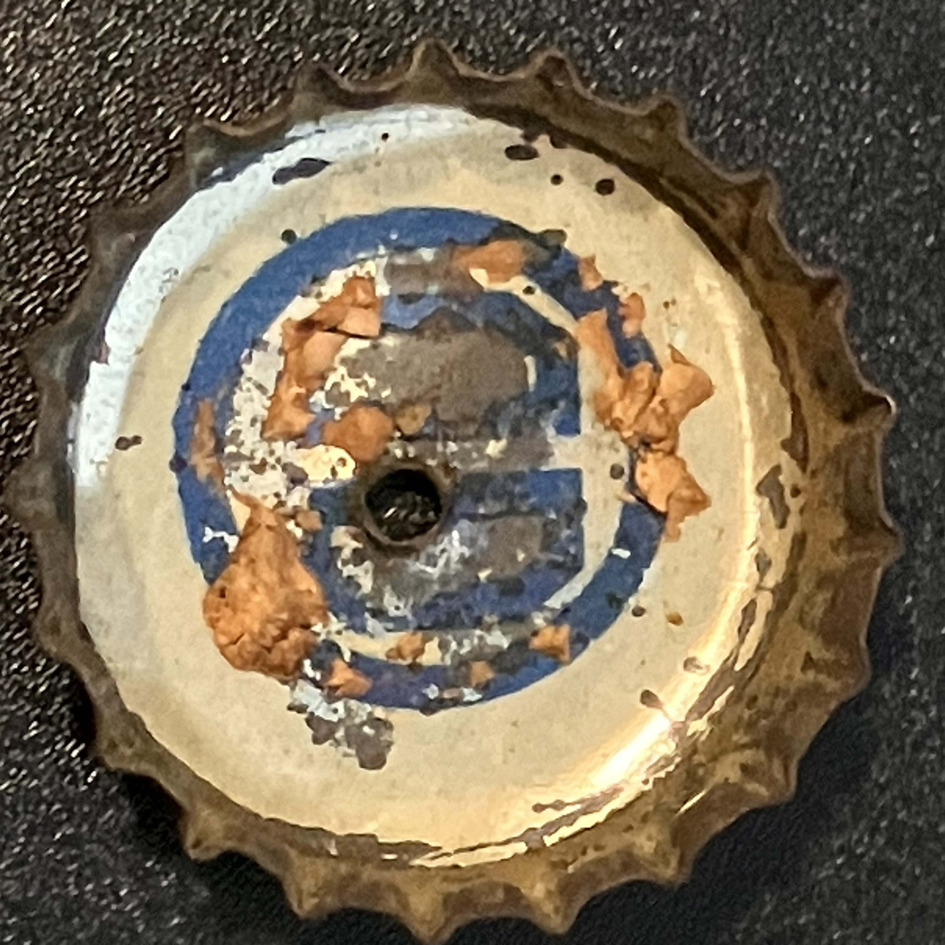 crown-cap liner of unadvertised variant