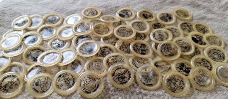 pile of shucked crown-cap liners